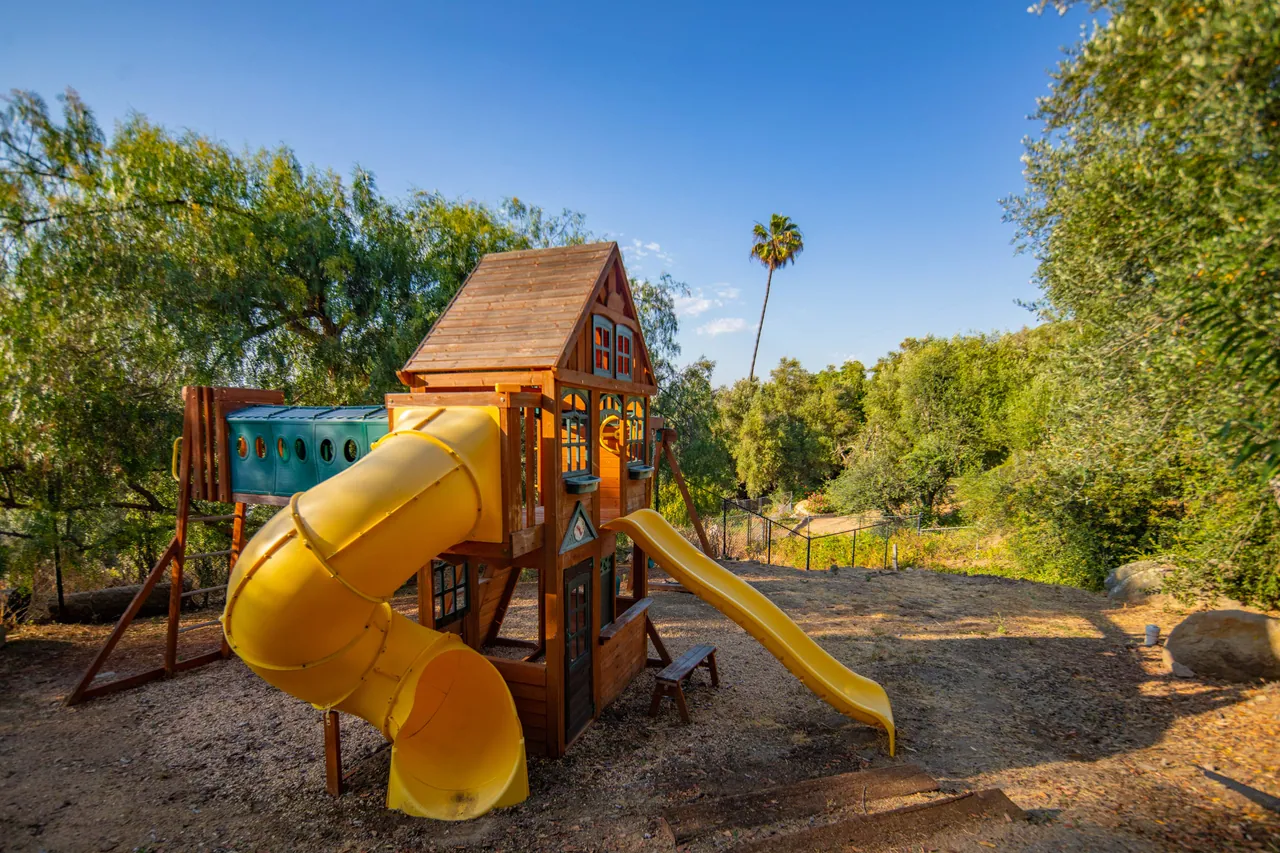 Play structure with slides